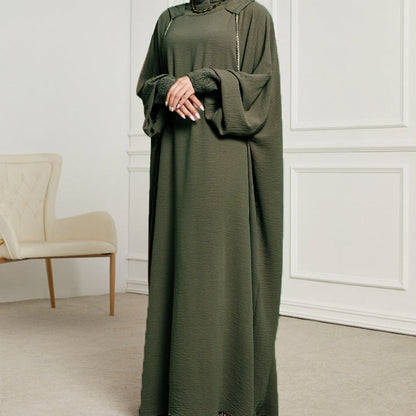 Weit geschnittener Damenkaftan mit langen Ärmeln und einer Kopfbedeckung für Frauen